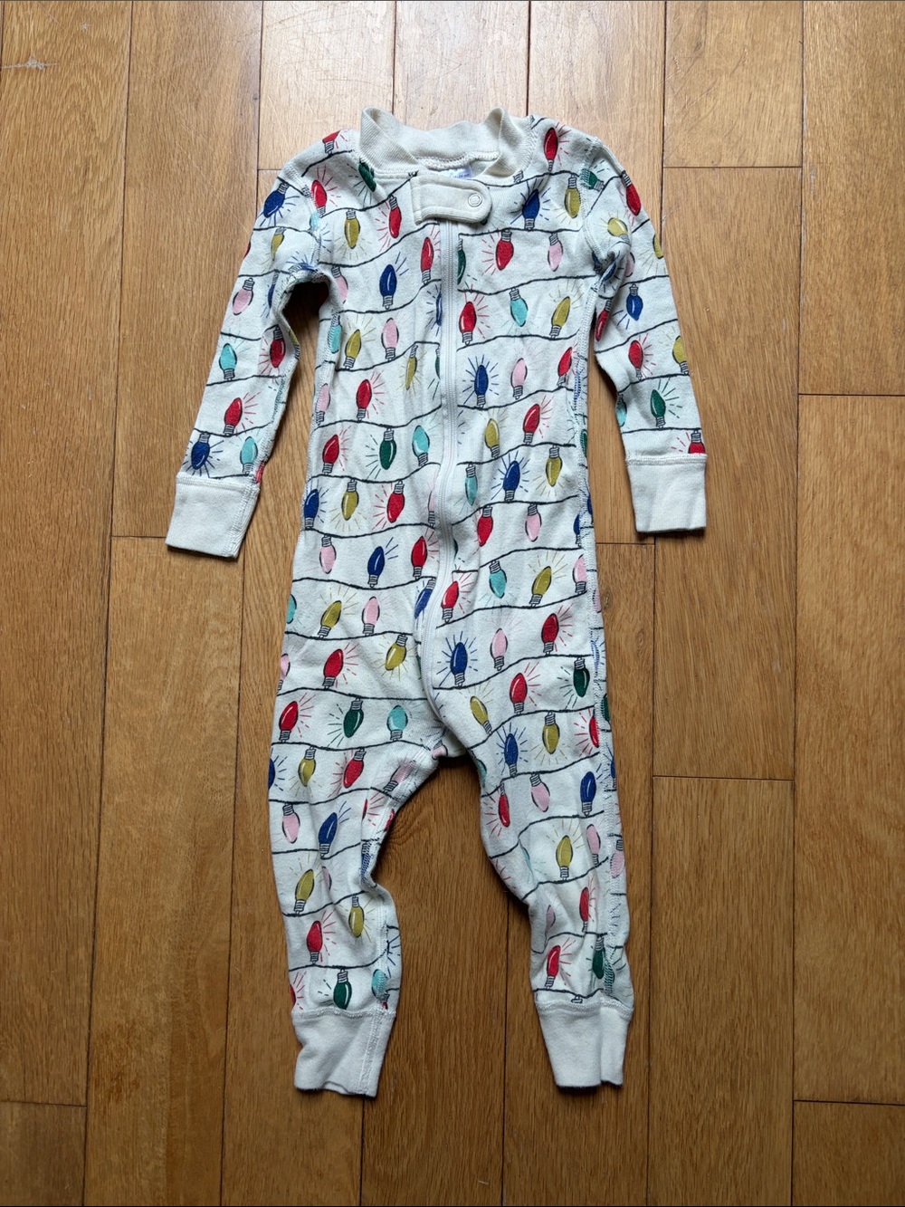 Hanna Andersson Kids White One-Piece Pajamas with Bright Bulbs Print